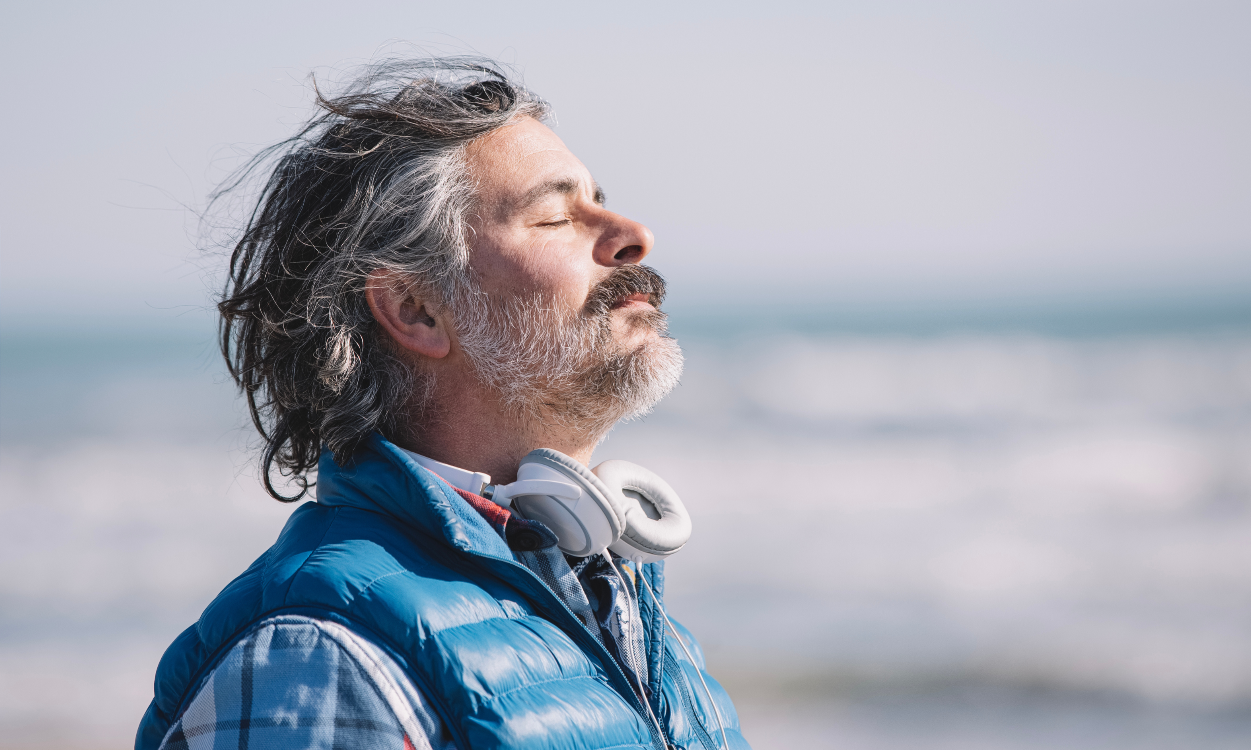 cognitive behavioral therapy benefits for anxiety, relaxed man, engaging in deep breathing at home cognitive behavioral therapy benefits for anxiety, relaxed man, engaging in deep breathing at home